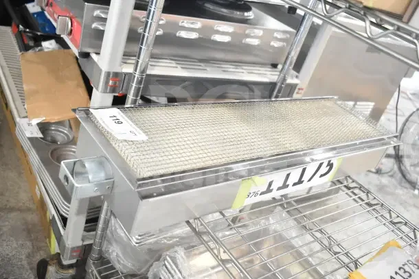 Brand new scratch and dent Imperial 1299 dual gas infrared burner, silver finish, visible label with item number 119.