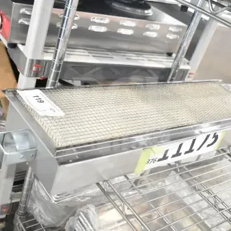 Brand new scratch and dent Imperial 1299 dual gas infrared burner, silver finish, visible label with item number 119.