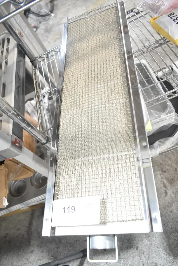 Brand new Imperial 1299 dual gas infrared burner, scratch and dent condition, metal mesh surface, item tag number 119.