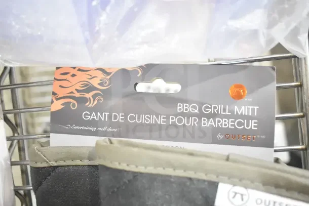 Outset® 76177 17" black flame retardant oven/grill mitt, new with packaging, featuring fire graphic and brand logo.