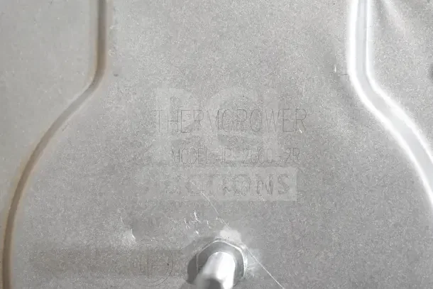 Engraved "THERMOPOWER" label on metallic surface, Model IR-2600-2R, 240V ~2600W specification visible.