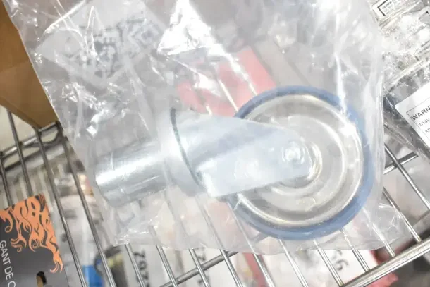 Packaged Vulcan 00-819078 swivel caster without brake, clear plastic bag, on metal shelf, brand new condition.