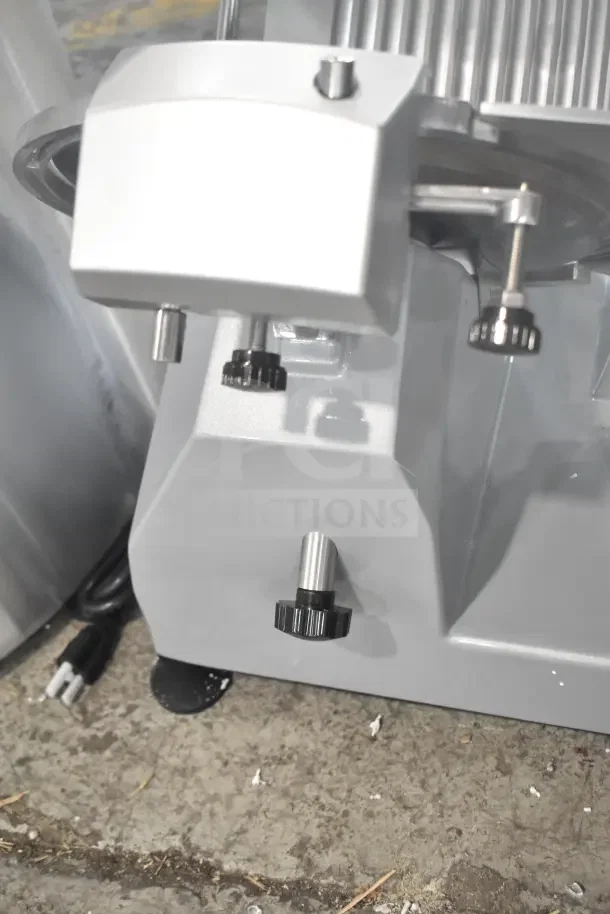 Brand new Backyard Pro 554SL112E 12" meat slicer, featuring blade sharpener, manual gravity feed, 120V, 1 phase.