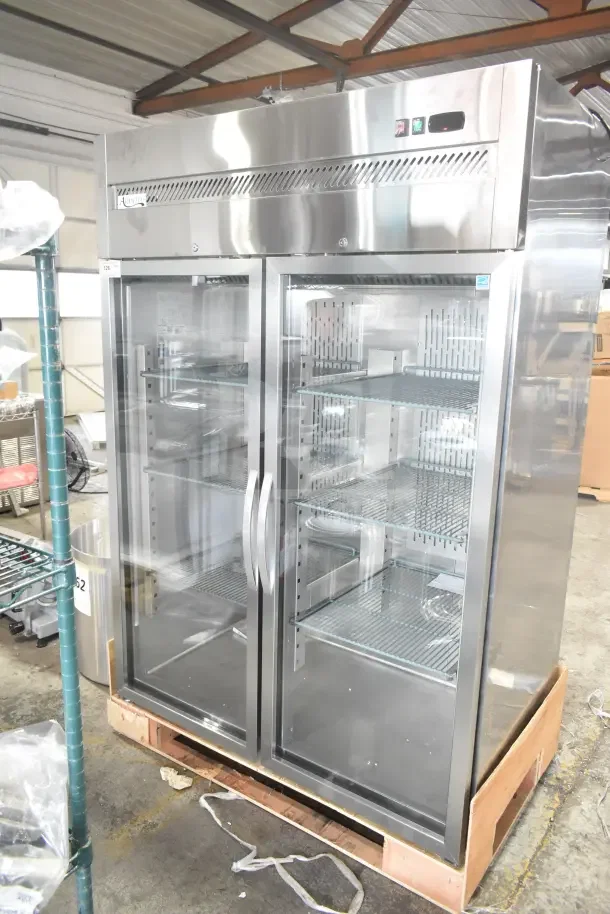 Brand new Avantco 178Z2RGHC commercial 2 door cooler merchandiser, 115V, 1 phase, visible shelves, scratch and dent condition.