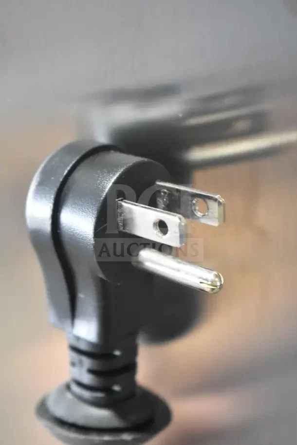 Close-up of a power plug for the 2025 Avantco 178Z2RGHC Commercial 2 Door Reach In Cooler, 115 volts, 1 phase.