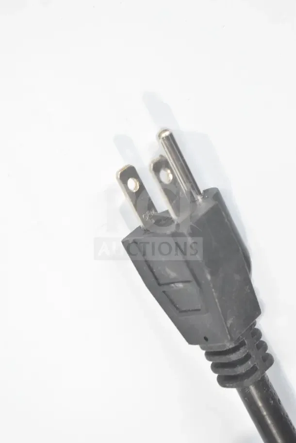 Close-up view of a standard three-prong power plug for the Avantco 194MCF322A ice machine.