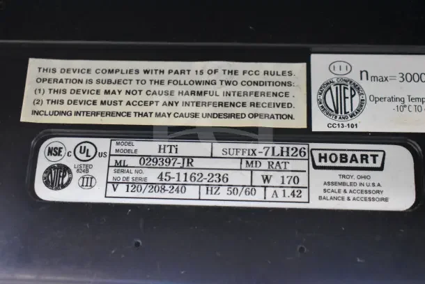 2017 Hobart HTi-7LH26 commercial food scale label showing model, specs, and certifications. Tested and working.