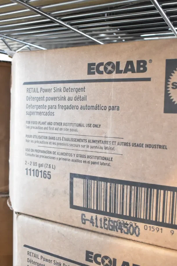 Cardboard box of Ecolab Retail Power Sink Detergent, 2-2 US gal, for institutional use, visible barcode and product number.