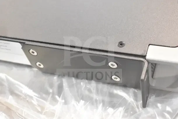 Bosch PRA-AD608 8 Channel Amplifier, metal casing, screws visible, partially packed in plastic, new condition.