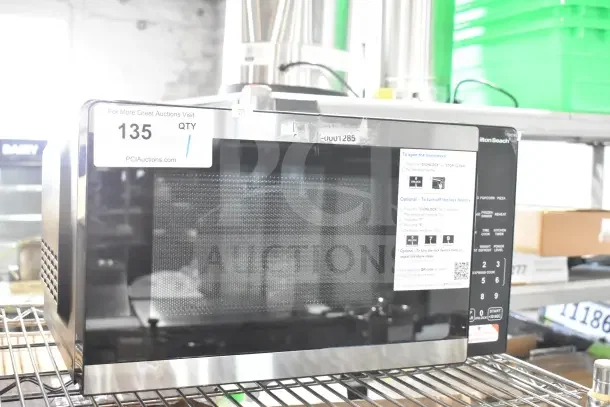 Hamilton Beach HB8436127995-01 Countertop Microwave Oven, 120V, 1 Phase, digital controls, good condition, auction ID tag visible.