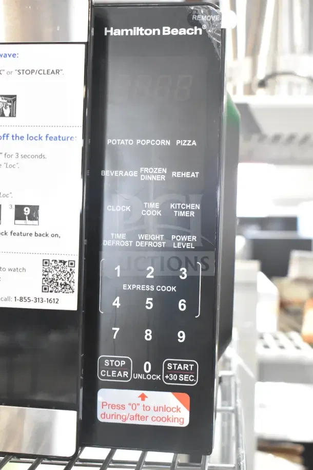 Hamilton Beach HB8436127995-01 Countertop Microwave Oven control panel, 120 Volts, 1 Phase, featuring preset functions and numerical keypad.