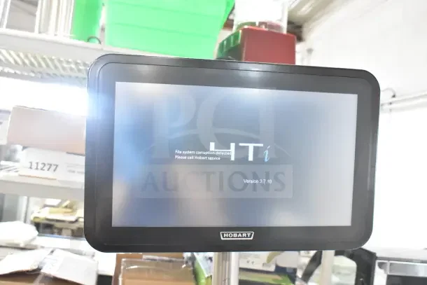 2023 Hobart HTi-SSLSC food portioning scale with display showing error message. Model HTi-SSLSC, 120/208-240V, 1 phase.