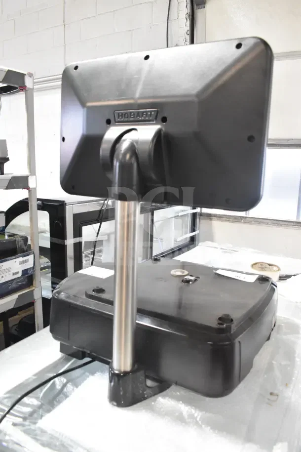 2023 Hobart HTi-SSLSC commercial countertop food portioning scale, 120/208-240V, tested and working, black finish.