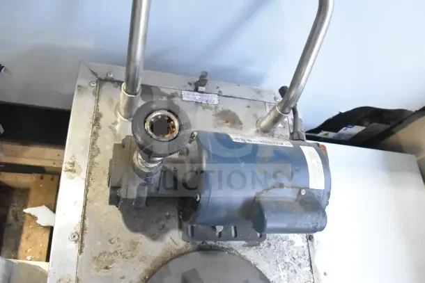 Frontline Commercial Oil Filtration System with metal casing and casters. Visible wear, includes pump and labeled control panel.