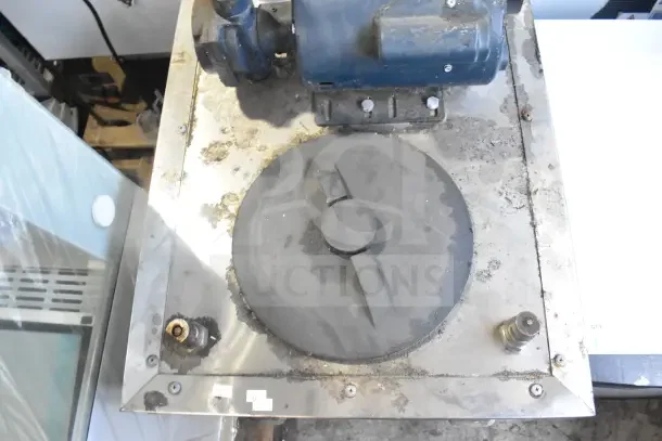 Frontline commercial oil filtration system with casters, showing wear and visible components; tags indicate industrial use.