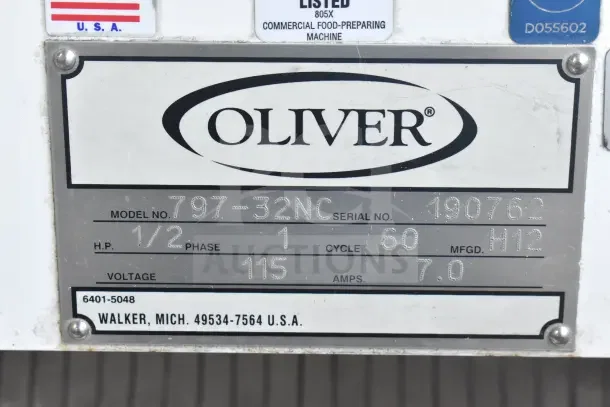 Oliver 797-32NC bread loaf slicer nameplate, showing model, serial number, voltage, phase, and manufacturing location.