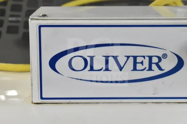 Oliver 797-32NC commercial bread slicer logo detail, featuring Pro Guard safety chute. 115V, 1 phase. Brand logo visible.