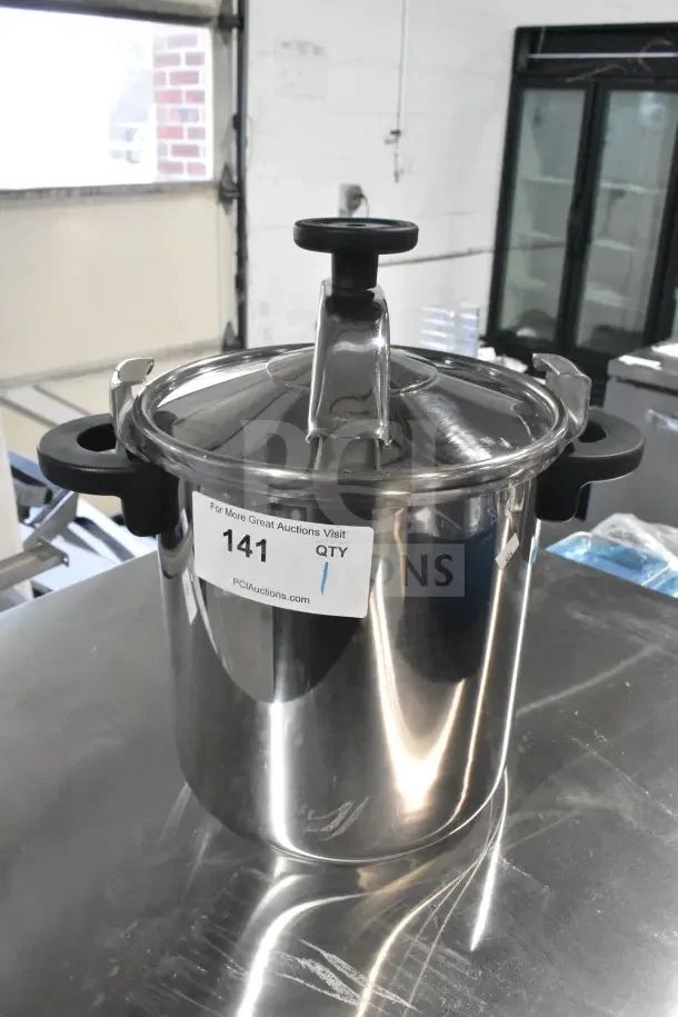 Monix INOX 18/10 pot, stainless steel, black handles, lid included, auction sticker labeled "141 QTY".