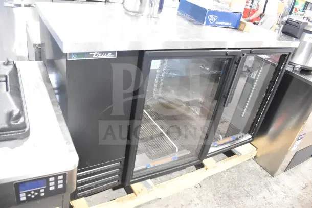 True TBB-2G-HC-LD Commercial 2 Door Back Bar Cooler, brand new with minor scratches, 115V, 1 Phase.