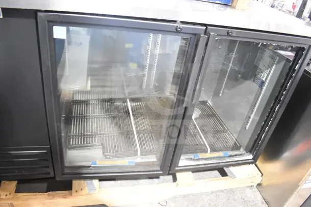 Brand new True TBB-2G-HC-LD commercial back bar cooler, glass doors, scratch and dent, 115V, 1 phase, on pallet.