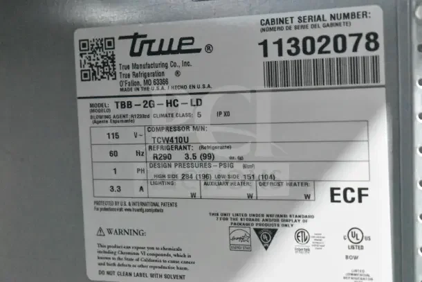 True TBB-2G-HC-LD commercial back bar cooler label. Shows model, serial number 11302078, and specifications. Brand-new.