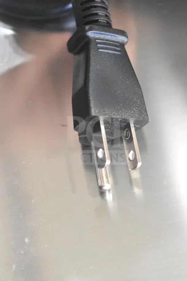 Close-up of a power plug for the Galaxy 177GRSC60 Commercial Rice Cooker. Plug suitable for 120 Volts, 1 Phase.