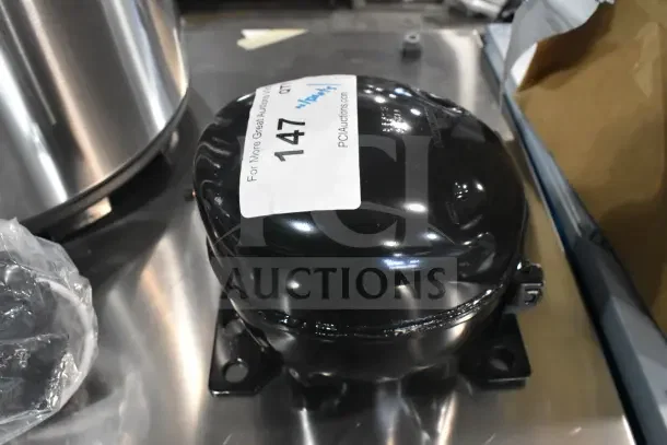 BRAND NEW Cubigel NUT70NR Avantco 17817638 Compressor, scratch and dent condition, with visible auction tag.