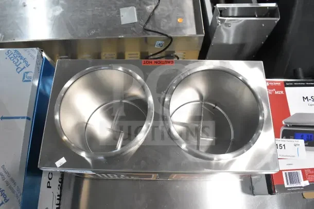 Carnival King 382RWS35DBL double 3.5 Qt. warmer with pumps, stainless steel, new with minor scratches, tagged as 120V, 1 phase.