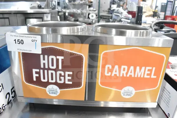 Brand new Carnival King 382RWS35DBL double 3.5 Qt. warmer with pumps, labeled for hot fudge and caramel, 120V, 1 phase.