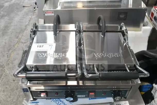 BRAND NEW Waring WPG300 Panini Supremo Grill, grooved, 17"x9.25" surface, 240V, 1 Phase, scratch and dent, labels visible.