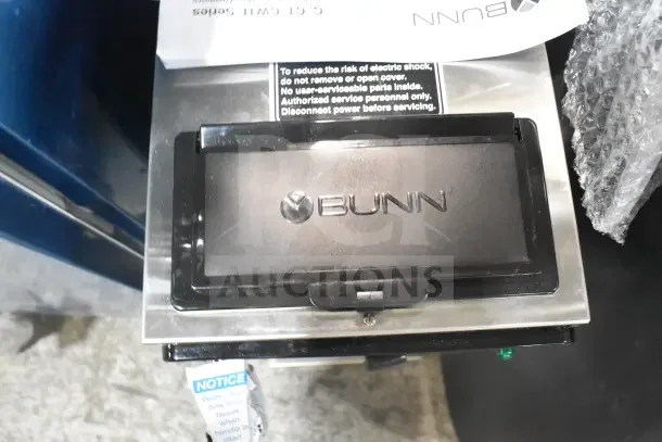 BRAND NEW Bunn CWTF15-APS 23001.0006 Automatic Airpot Coffee Brewer with a protective label, hot water faucet, 120V.