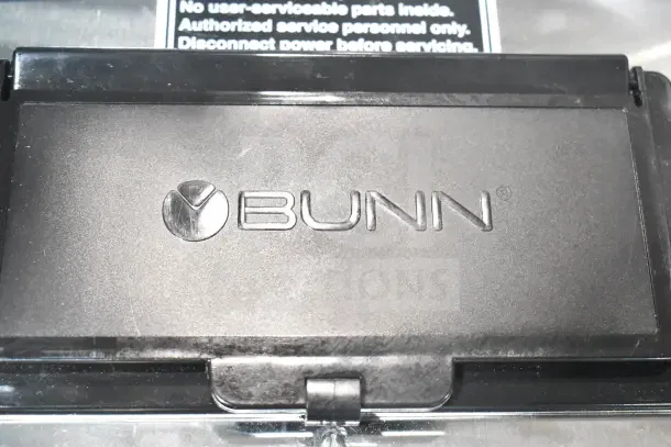 Brand new Bunn CWTF15-APS coffee brewer, model 23001.0006, with hot water faucet. Scratch and dent, 120V, 1 phase.