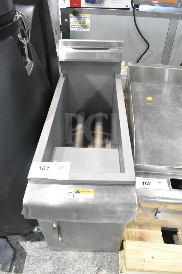 BRAND NEW SCRATCH AND DENT CPG FCPG15 countertop fryer, 15 lb capacity, 26,500 BTU, natural gas, visible tags and warning label.