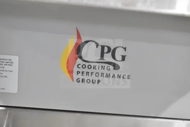 BRAND NEW CPG FCPG15 countertop fryer, 15 lb capacity, natural gas, 26,500 BTU, minor scratches, logo visible.