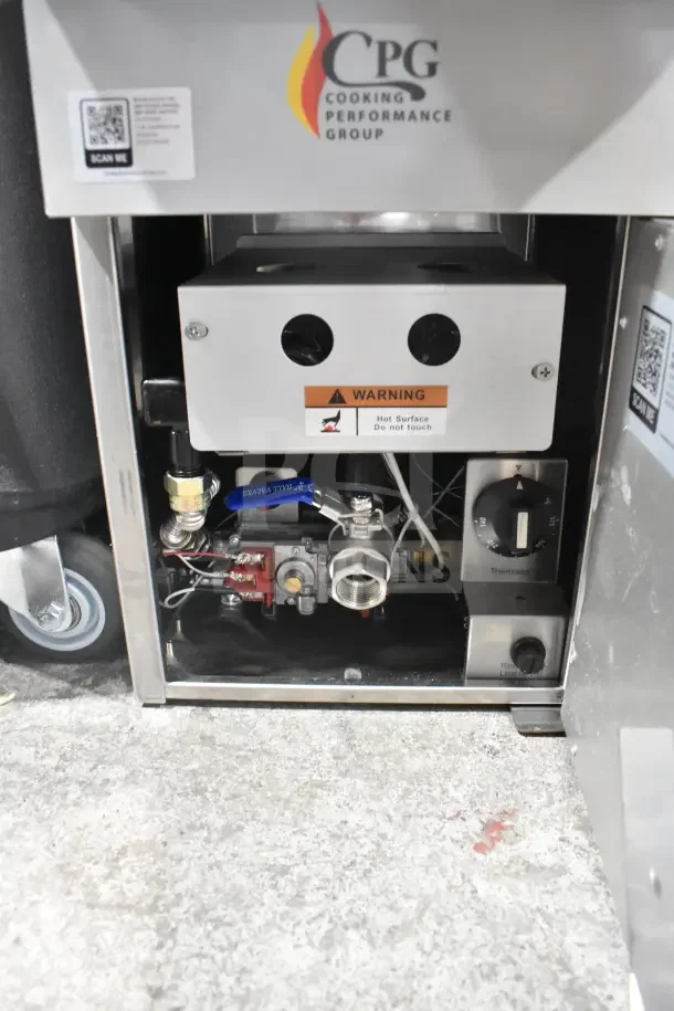 BRAND NEW CPG FCPG15 natural gas fryer, 15 lb. capacity, 26,500 BTU, scratch and dent, with visible warning label.