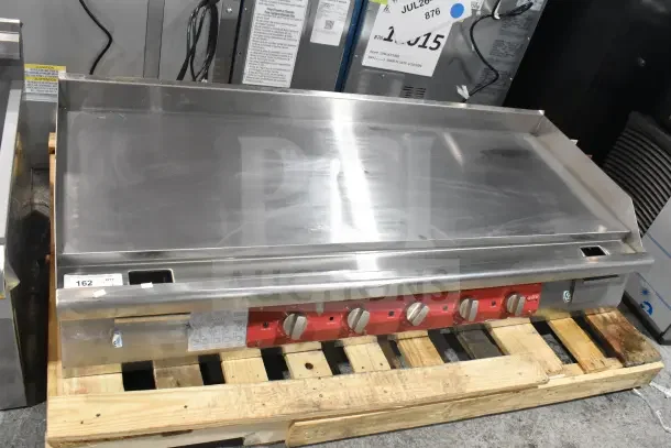 Avantco 177EG60C 60" electric countertop griddle, brand new with minor dents, 208 volts, 1 phase, stainless steel.