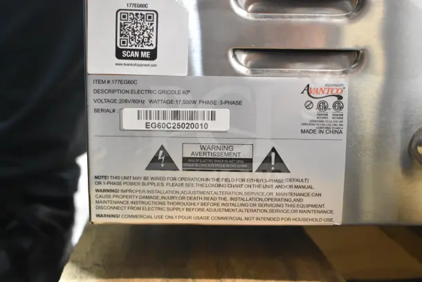 Brand new Avantco 177EG60C 60" electric countertop griddle, 208V, 1 phase, scratch and dent condition, with warning labels.
