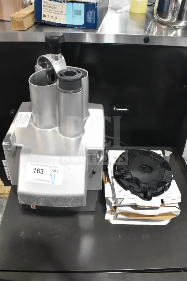 Brand new Robot Coupe CL50 Series E food processor, scratch and dent, with blades, 120V, 1 phase, Tex-Mex dice feature.