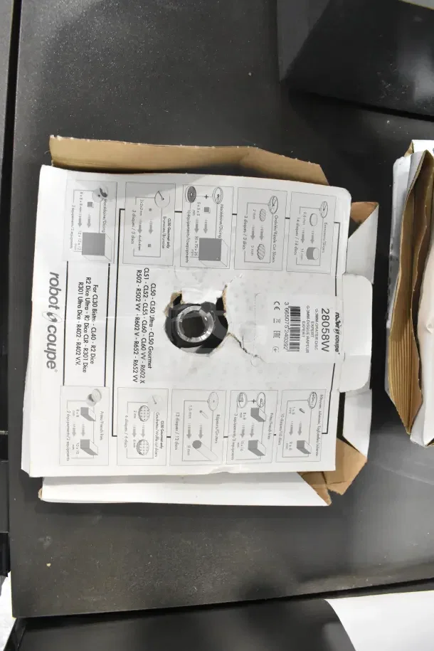 Brand new Robot Coupe CL50 food processor in box. Includes blades, Tex-Mex dice function. 120V, 1 phase. Box is scratched.