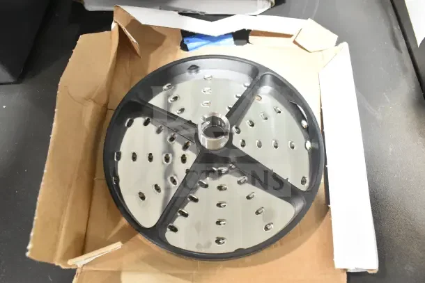 Robot Coupe CL50 Series E food processor disc, brand new, in original packaging.