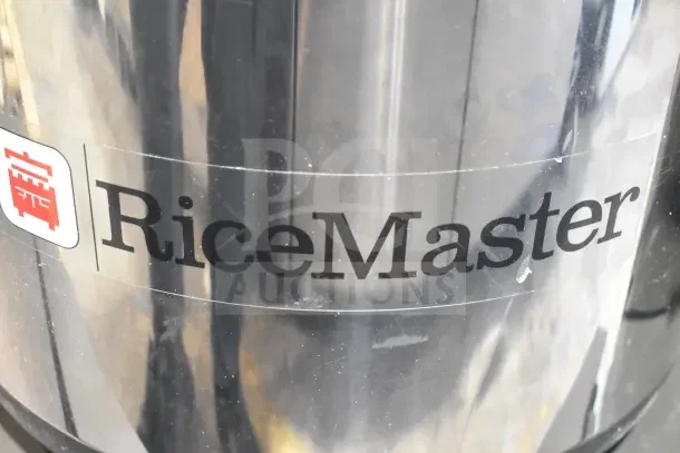 BRAND NEW SCRATCH AND DENT! 2025 RiceMaster 56913S Sushi Rice Container, 96 cup, stainless steel finish. RiceMaster logo visible.