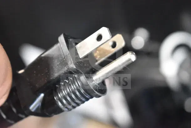 A close-up of a power plug for the Avantco 194EUCF160A undercounter ice machine, showing prongs and cable detail.