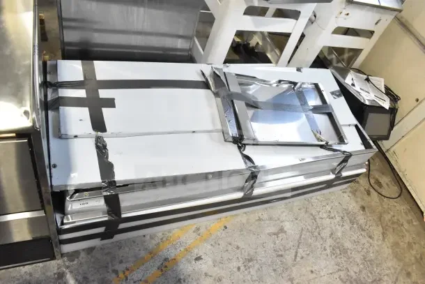 BRAND NEW 2026 ServIt 423EST4WOPBH Four Pan Electric Steam Table, minor scratches, 208/240V, partially enclosed base.