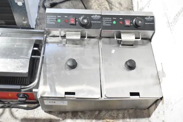 Brand new MainStreet Equipment F20E dual tank electric fryer, 20 lb capacity, 110 volts, visible control panel, slight dents.