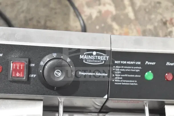 MainStreet Equipment F20E 20 lb. dual-tank electric countertop fryer, temperature dial, and switch. New, scratch and dent.