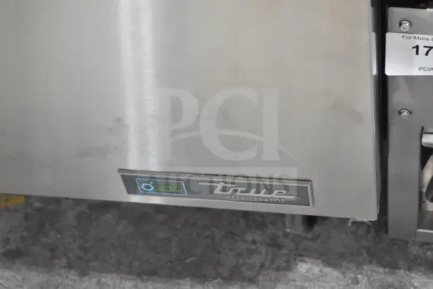 Brand new True TSSU-48-18MB-HC prep table, stainless steel with minor scratches, natural refrigerant label visible.