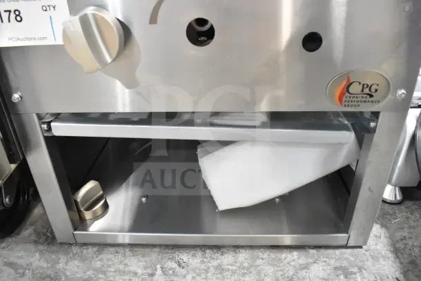 BRAND NEW CPG-SP-18-N Natural Gas Stock Pot Range, 80,000 BTU, scratch and dent, CPG logo visible, auction tag.