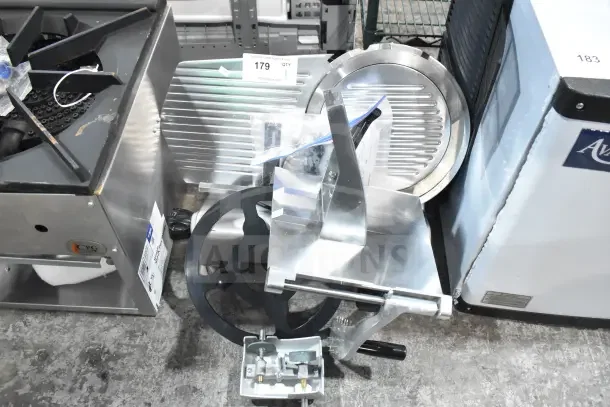 BRAND NEW Avantco 177SL312 12" Meat Slicer, 110-120V, manual gravity feed, minor scratches, CPG model 351CPGSP18N.