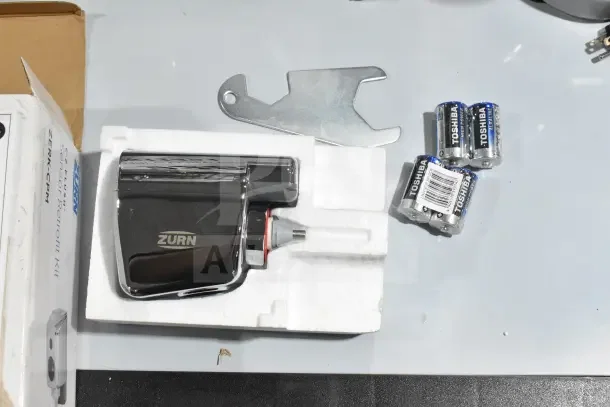 BRAND NEW Zurn Elkay ZERK-CPM AquaSense E-Z Flush Automatic Kit for Toilet/Urinal Valves, includes batteries and tool.