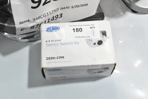 Brand new Zurn Elkay ZERK-CPM AquaSense E-Z Flush automatic infrared retrofit kit for toilet and urinal flush valves, box present.
